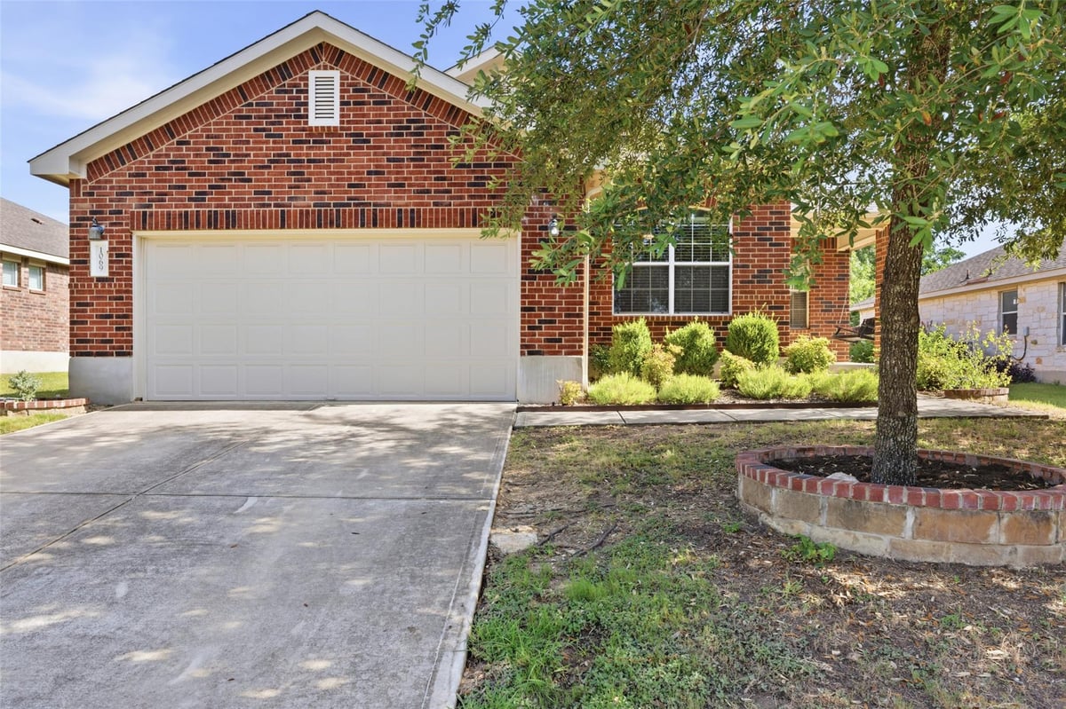 View 1069 Talley LOOP in Garlic Creek West Ph Iii Sec 3 1069 Talley LOOP - front exterior - Luxury home in Garlic Creek West Ph Iii Sec 3, Buda, TX