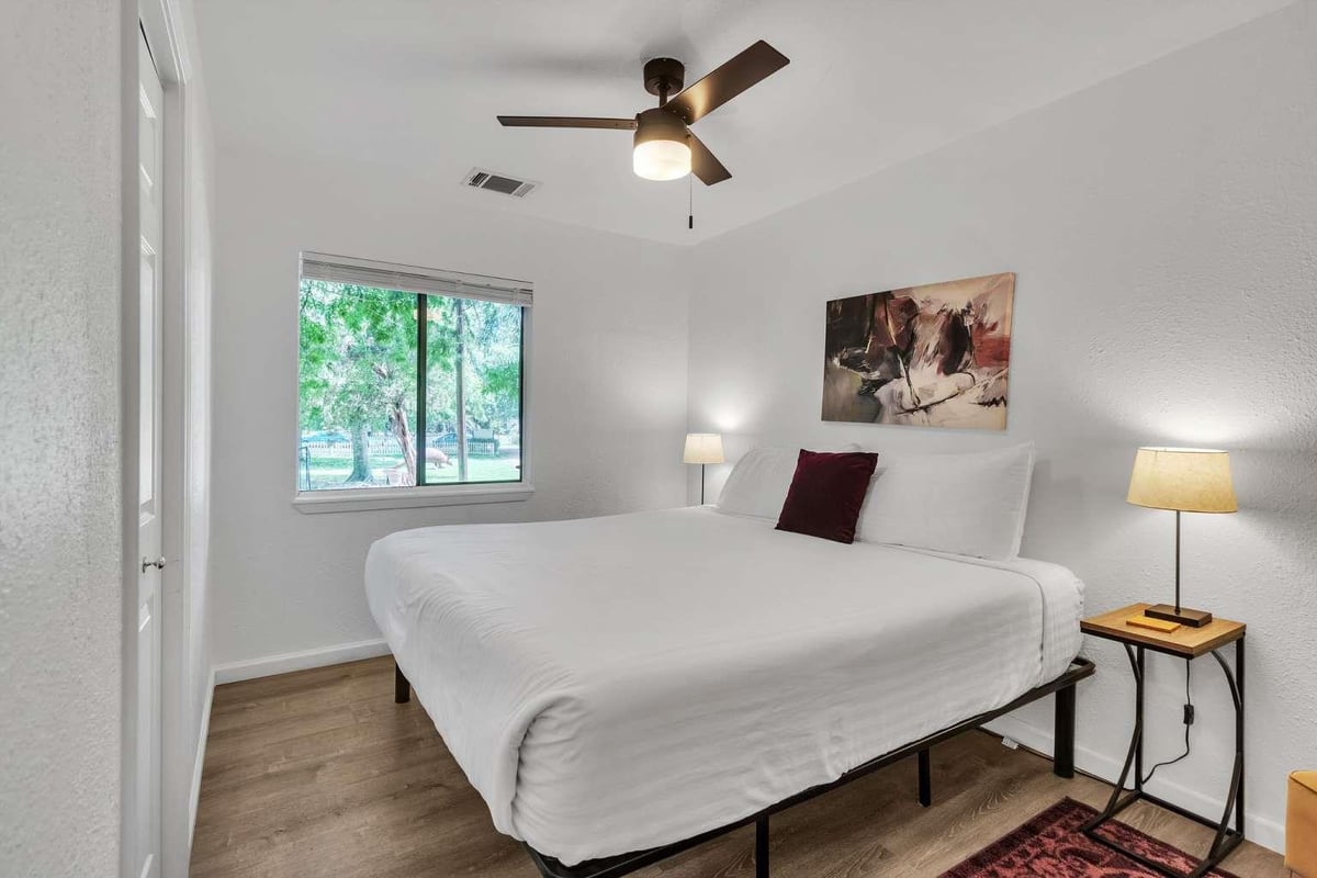 Primary bedroom at 107-109 Scudder Ln - Cypress Creek North, Wimberley, TX