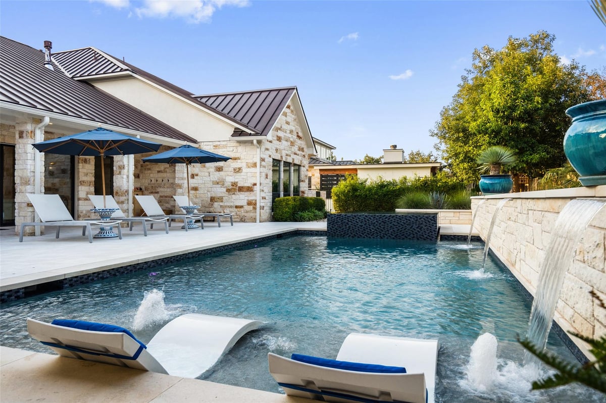 View 107 Bisset Ct in Rough Hollow 107 Bisset Ct - front exterior - Luxury home in Rough Hollow, Austin, TX