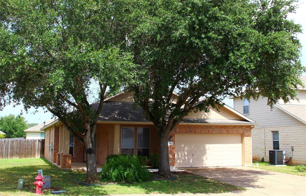 View 107 Buck Shot CT in Hunters Crossing 107 Buck Shot CT - property photo 1 - Luxury home in Hunters Crossing, Bastrop, TX
