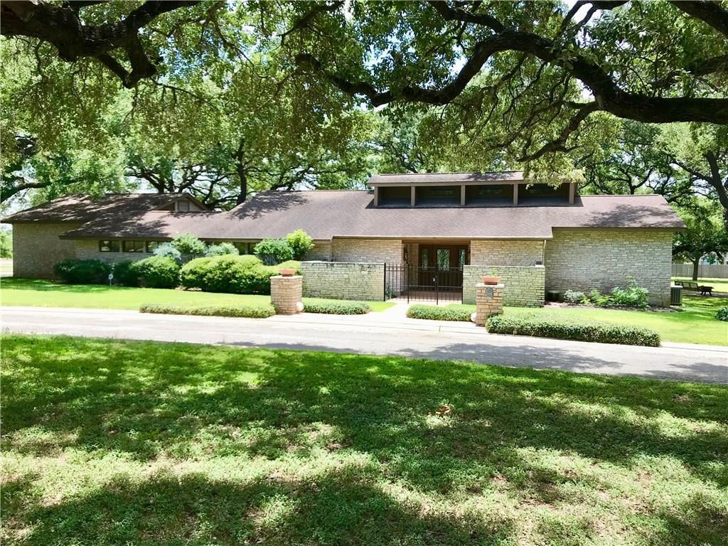 View 107 Country LN 107 Country LN - front exterior - Luxury home in Seguin, TX