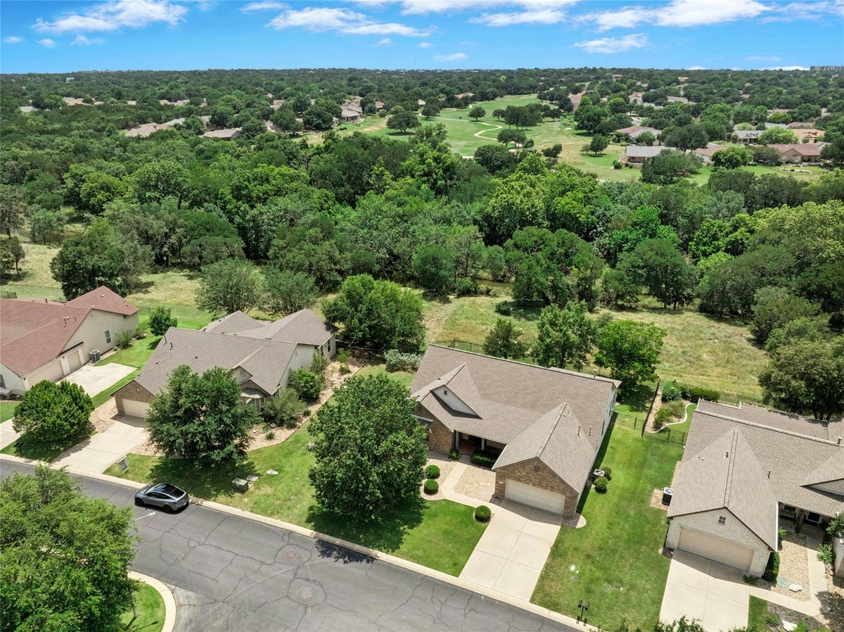 View 107 Crystal Springs DR in Sun City Georgetown Neighborhood 02 Amd B 107 Crystal Springs DR - front exterior - Luxury home in Sun City Georgetown Neighborhood 02 Amd B, Georgetown, TX