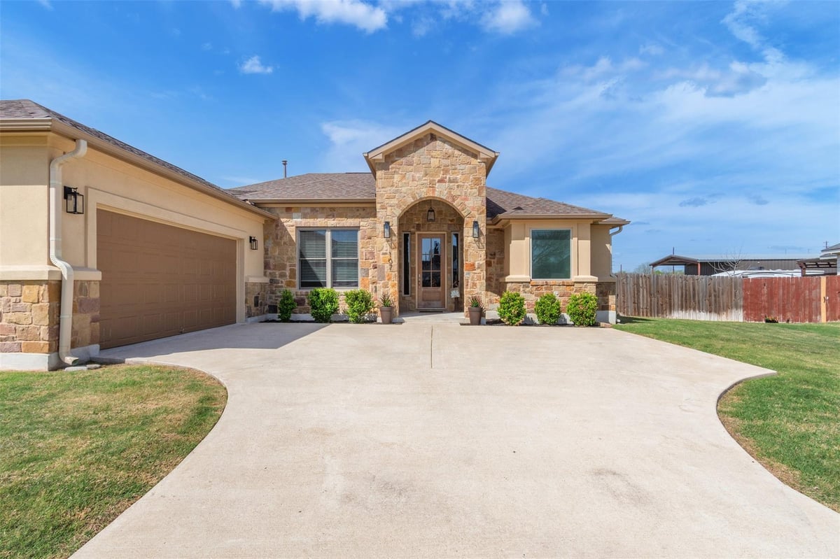 View 107 Les Ln in Hurta River Estates 107 Les Ln - front exterior - Luxury home in Hurta River Estates, Smithville, TX