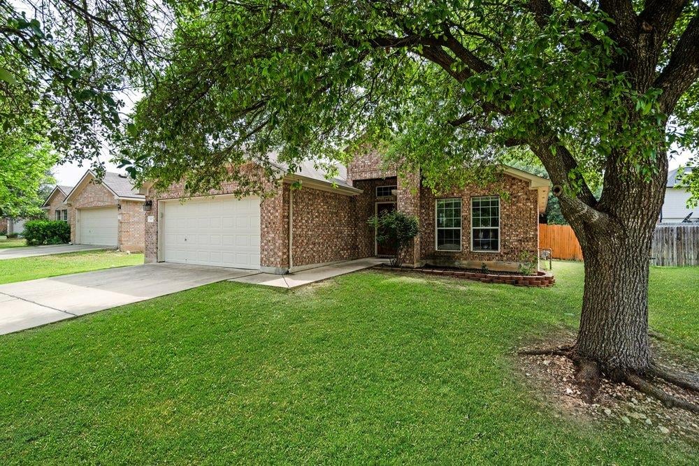View 107 S Treasure Oaks Dr in Old Town Village Sec 02b 107 S Treasure Oaks Dr - front exterior - Luxury home in Old Town Village Sec 02b, Leander, TX