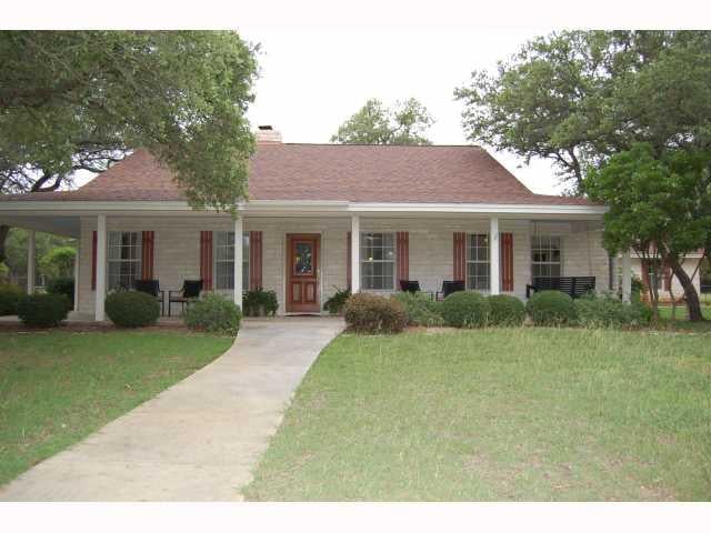View 10700 FM 150 10700 FM 150 - front exterior - Luxury home in Driftwood, TX