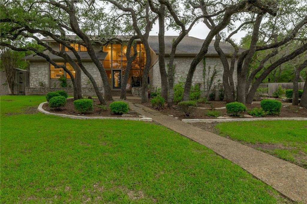 View 10704 Spicewood Pkwy in Spicewood At Balcones Villages 10704 Spicewood Pkwy - front exterior - Luxury home in Spicewood At Balcones Villages, Austin, TX