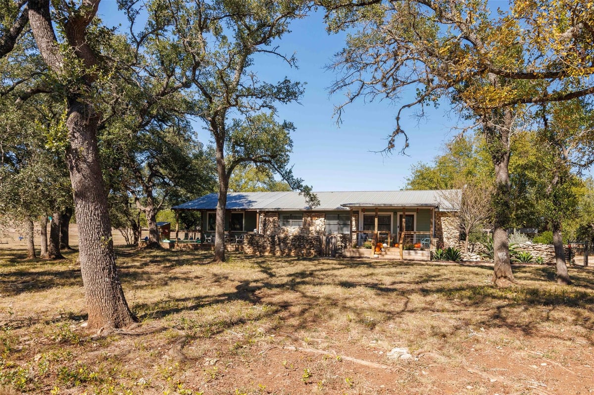View 1071 Rolling Hills Dr in Shadow Valley 1071 Rolling Hills Dr - front exterior - Luxury home in Shadow Valley, Wimberley, TX