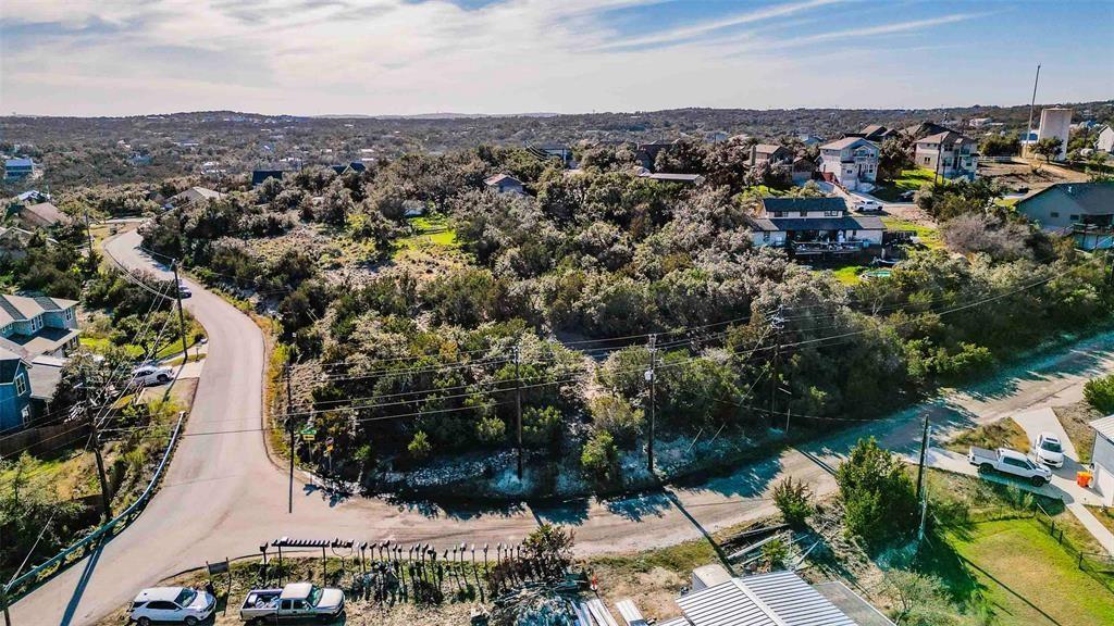 View 10722 Lake Park Dr in Highland Creek Lakes Sec 01 10722 Lake Park Dr - front exterior - Luxury lot in Highland Creek Lakes Sec 01, Dripping Springs, TX