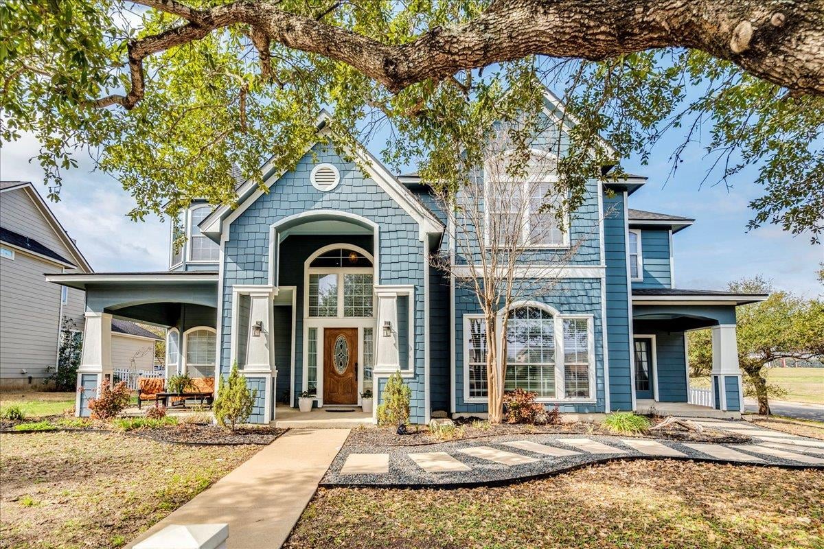 View 1077 Fairway in Plum Creek Ph 1 Sec 4 1077 Fairway - front exterior - Luxury home in Plum Creek Ph 1 Sec 4, Kyle, TX