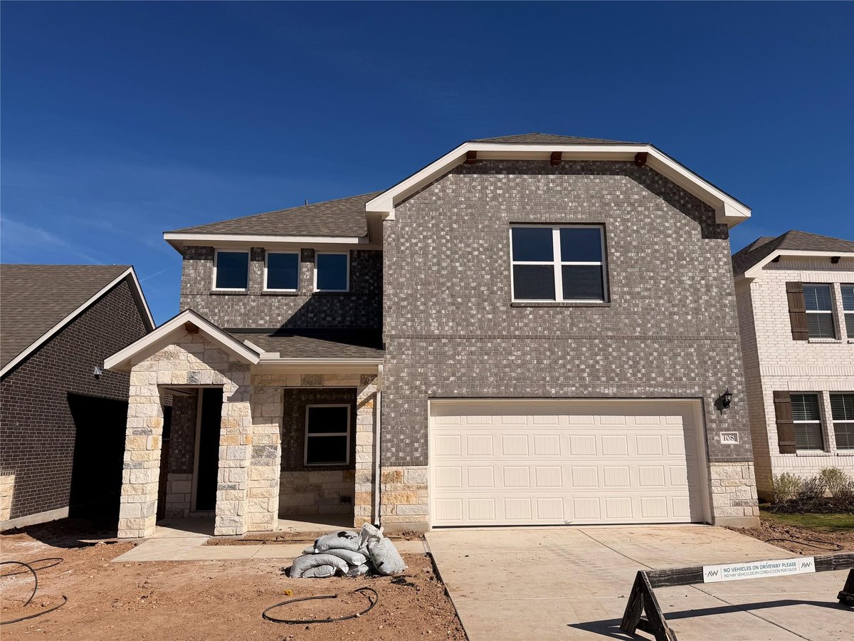 View 108 Coleto Trl in The Colony 108 Coleto Trl - front exterior - Luxury home in The Colony, Bastrop, TX