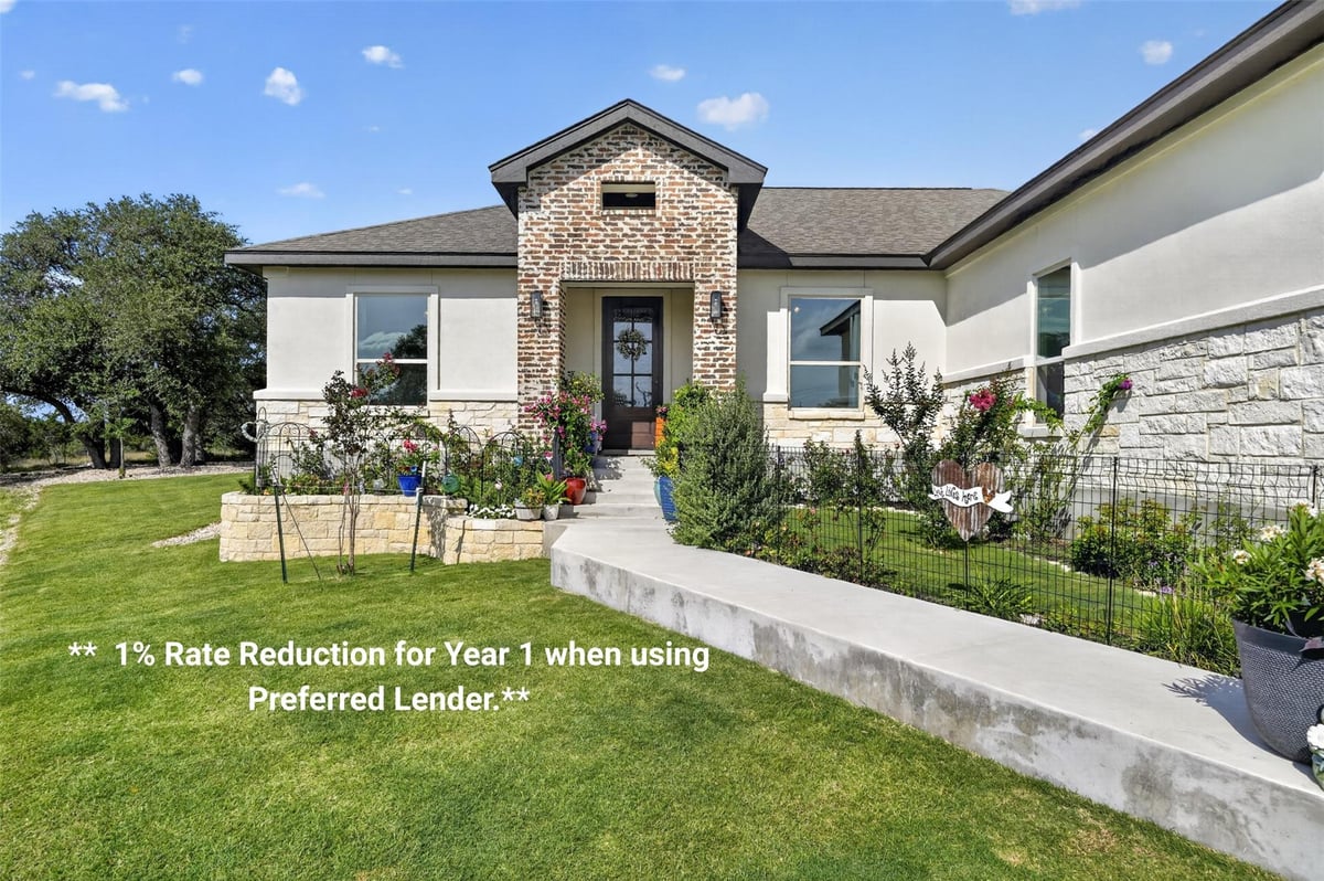 View 108 Monroe Upton CT in Rockin J Ranch 108 Monroe Upton CT - front exterior - Luxury home in Rockin J Ranch, Blanco, TX
