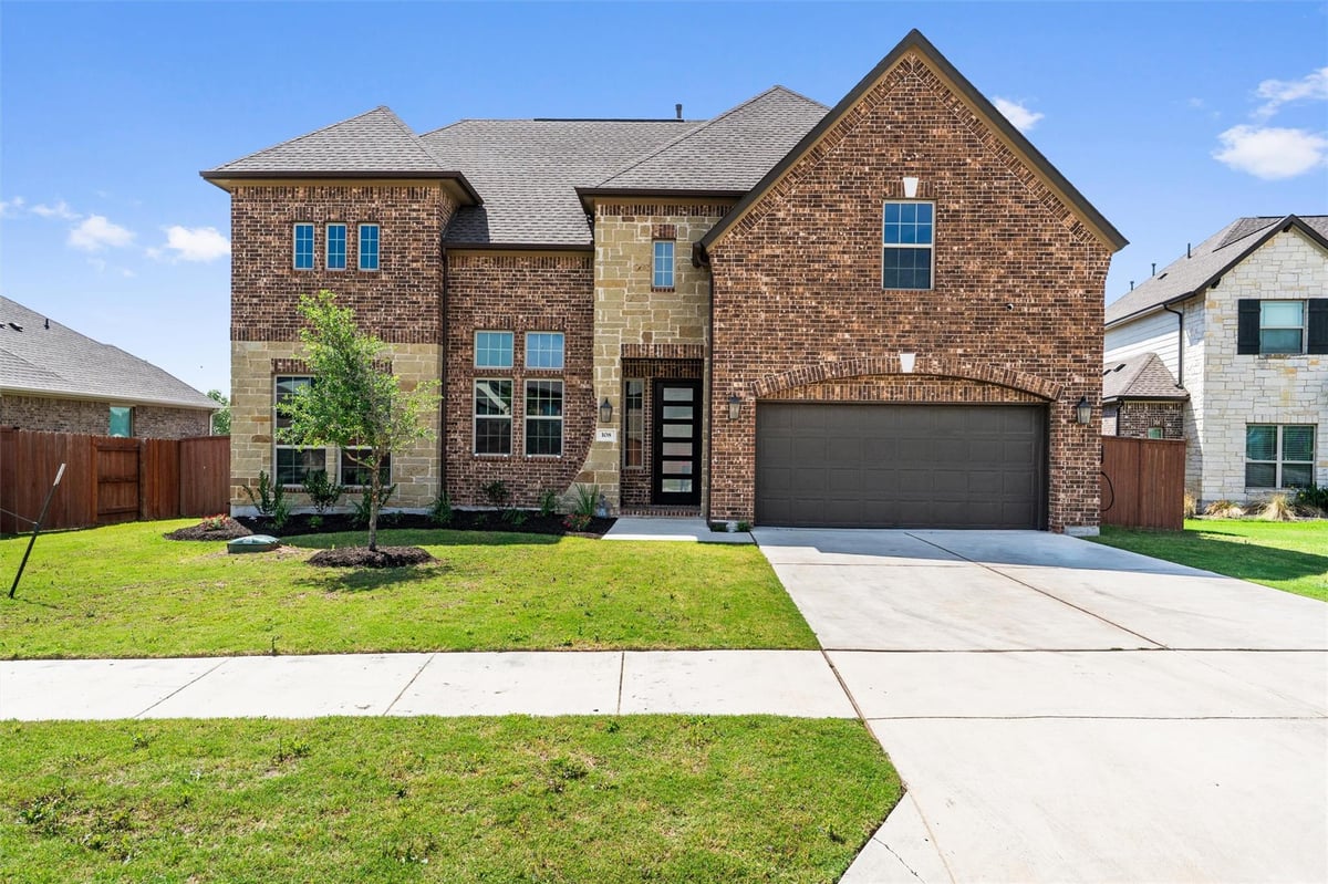 View 108 Rio Ranchero Rd in Oaks at San Gabriel 108 Rio Ranchero Rd - front exterior - Luxury home in Oaks at San Gabriel, Georgetown, TX