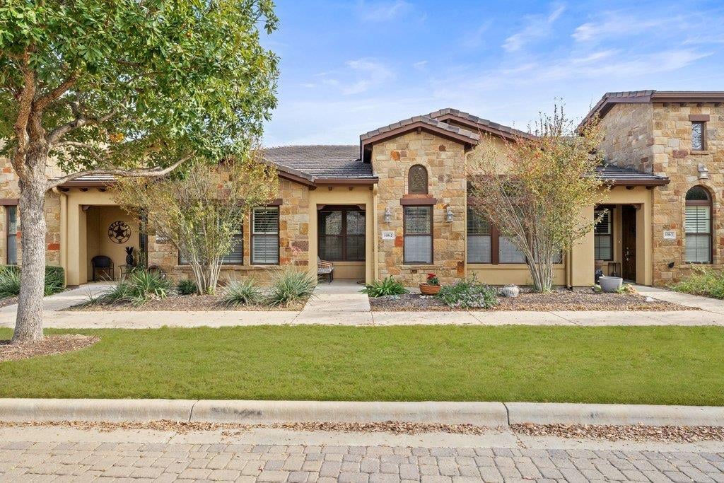 View 108 Rivalto Cir Unit #2 in Townhomes At Tuscan Village 108 Rivalto Cir Unit #2 - front exterior - Luxury home in Townhomes At Tuscan Village, Lakeway, TX