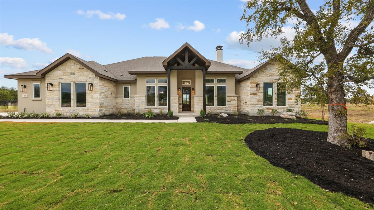 View 108 Tranquility Trl in Spicewood Trails 108 Tranquility Trl - front exterior - Luxury home in Spicewood Trails, Spicewood, TX