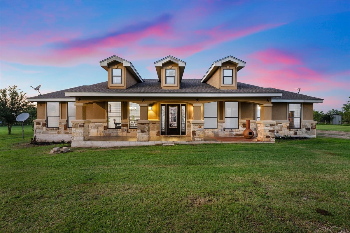 View 108 Whispering Pines Dr in Bastrop Town Tr 108 Whispering Pines Dr - front exterior - Luxury home in Bastrop Town Tr, Bastrop, TX