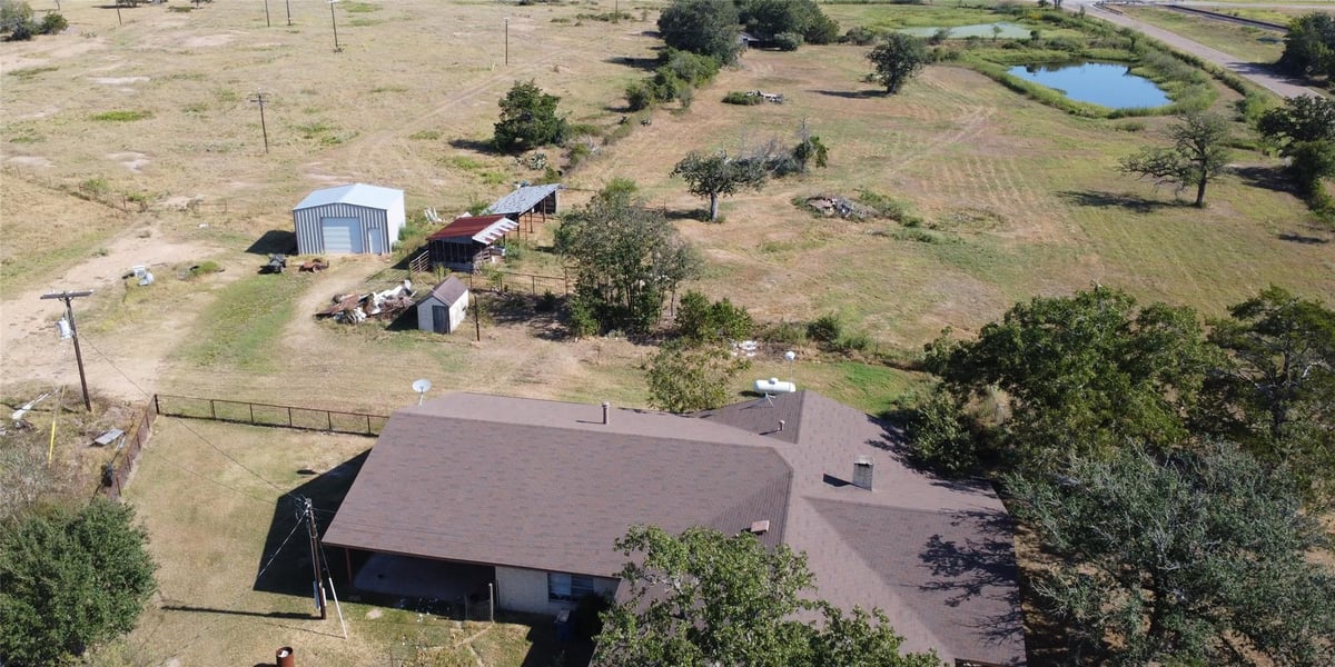 View 1080 County Road 213 1080 County Road 213 - front exterior - Luxury home in Giddings, TX