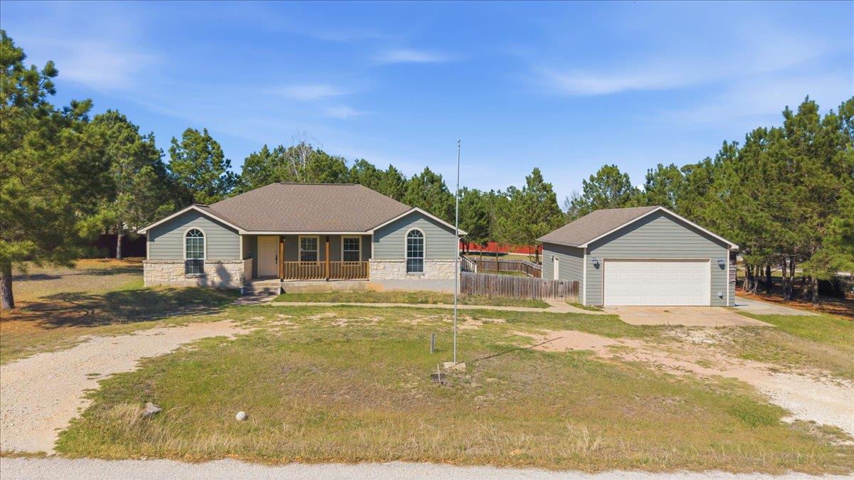 View 109 Bonham Ln in Circle D 109 Bonham Ln - front exterior - Luxury home in Circle D, Paige, TX