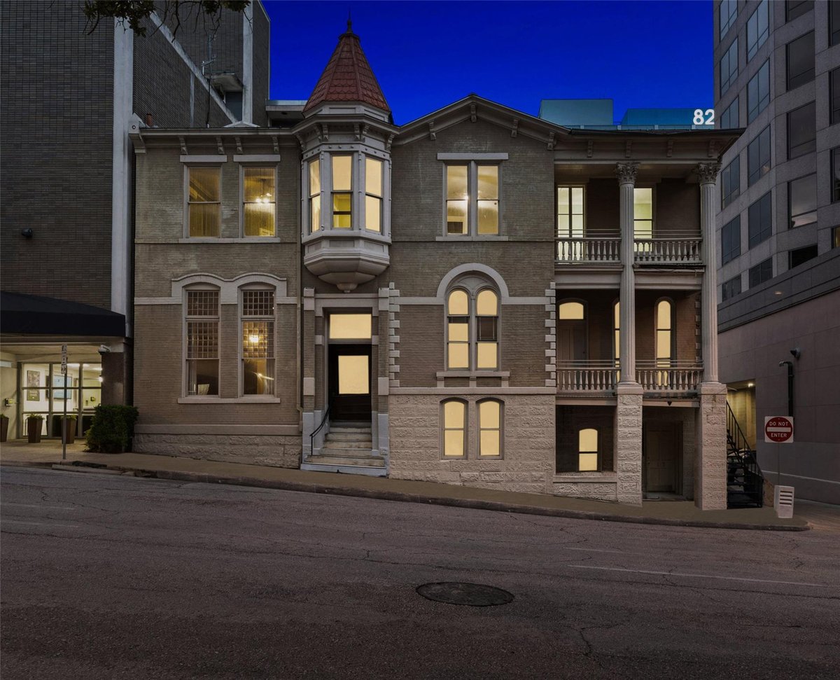 View 109 E 10th St in Block 111 Original City 109 E 10th St - front exterior with 109 E 10th St in Austin - Luxury home in Block 111 Original City, Austin, TX