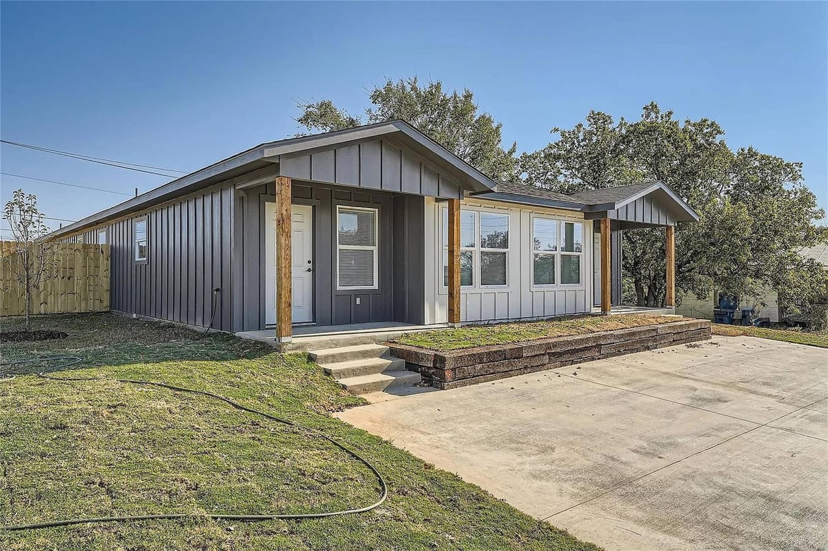 View 109 Fisher St Unit #BLD 109, 111, 113 in MP Estates 109 Fisher St Unit #BLD 109, 111, 113 - front exterior - Luxury home in MP Estates, Elgin, TX