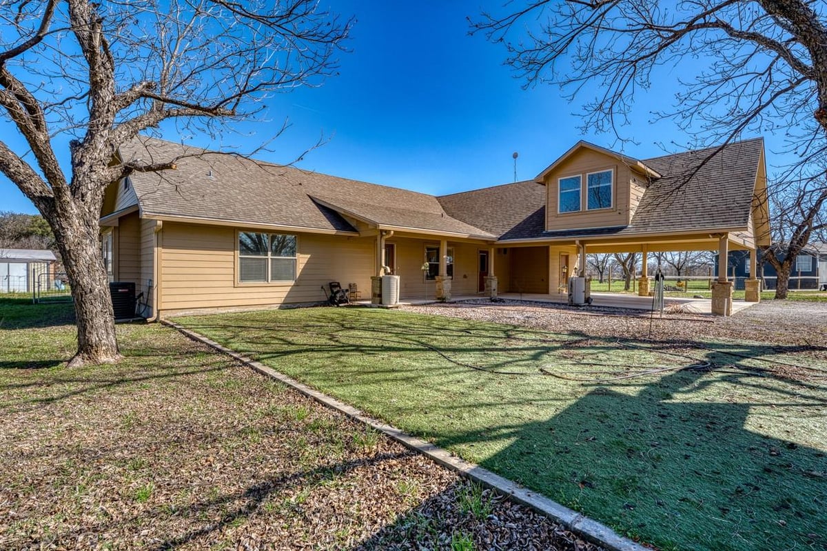 View 109 Pecan Orchard Ln in Pecan Orchard 109 Pecan Orchard Ln - front exterior - Luxury home in Pecan Orchard, Marble Falls, TX