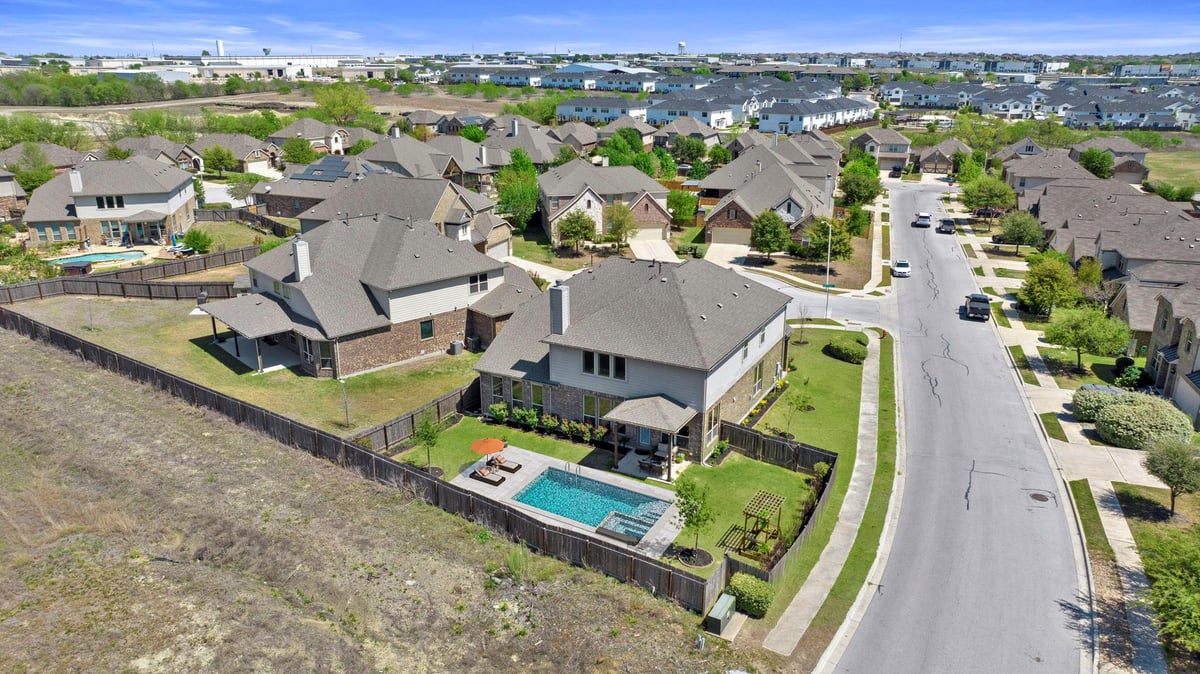 View 109 Wake Grv in The Meadows At Buda Ph Four-B 109 Wake Grv - front exterior - Luxury home in The Meadows At Buda Ph Four-B, Buda, TX