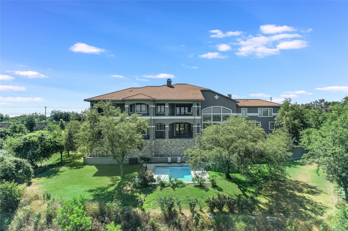 View 10901 W Highway 71 in Madrones 10901 W Highway 71 - front exterior - Luxury home in Madrones, Austin, TX