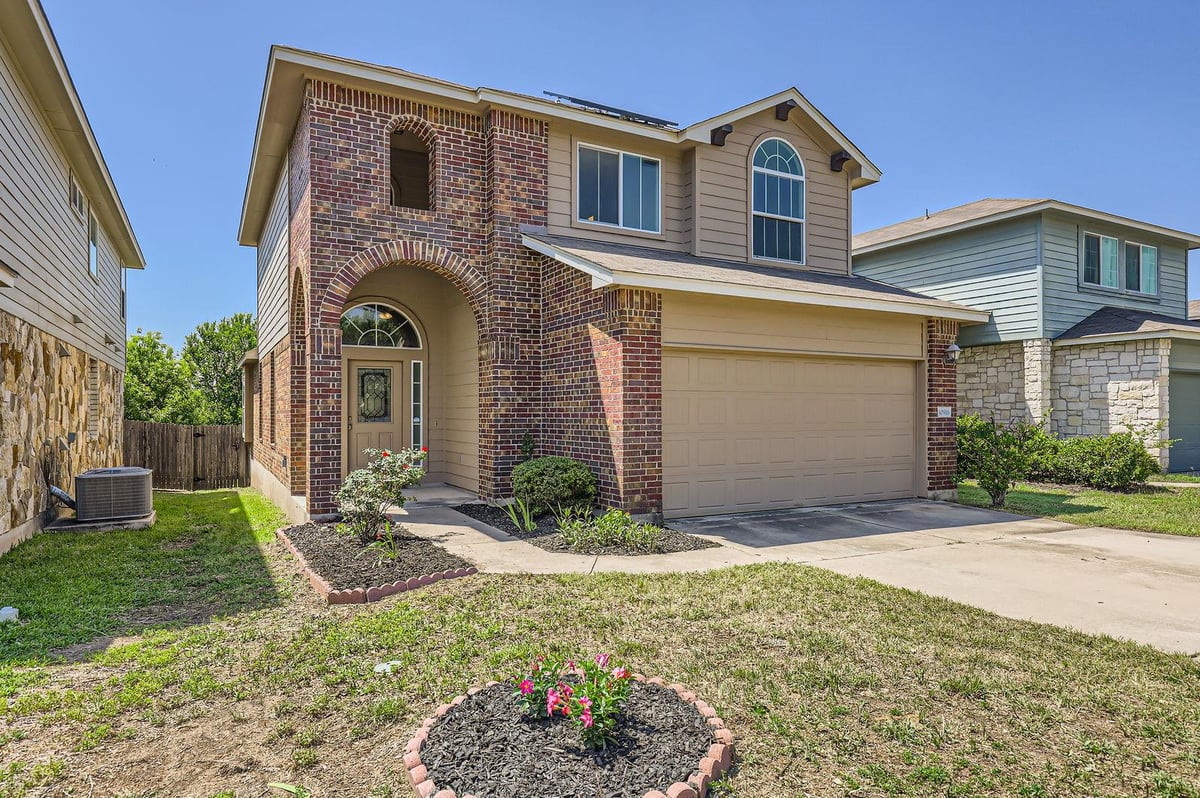 View 10916 Worn Sole Dr in PIONEER CROSSING WEST 10916 Worn Sole Dr - front exterior - Luxury home in PIONEER CROSSING WEST, Austin, TX