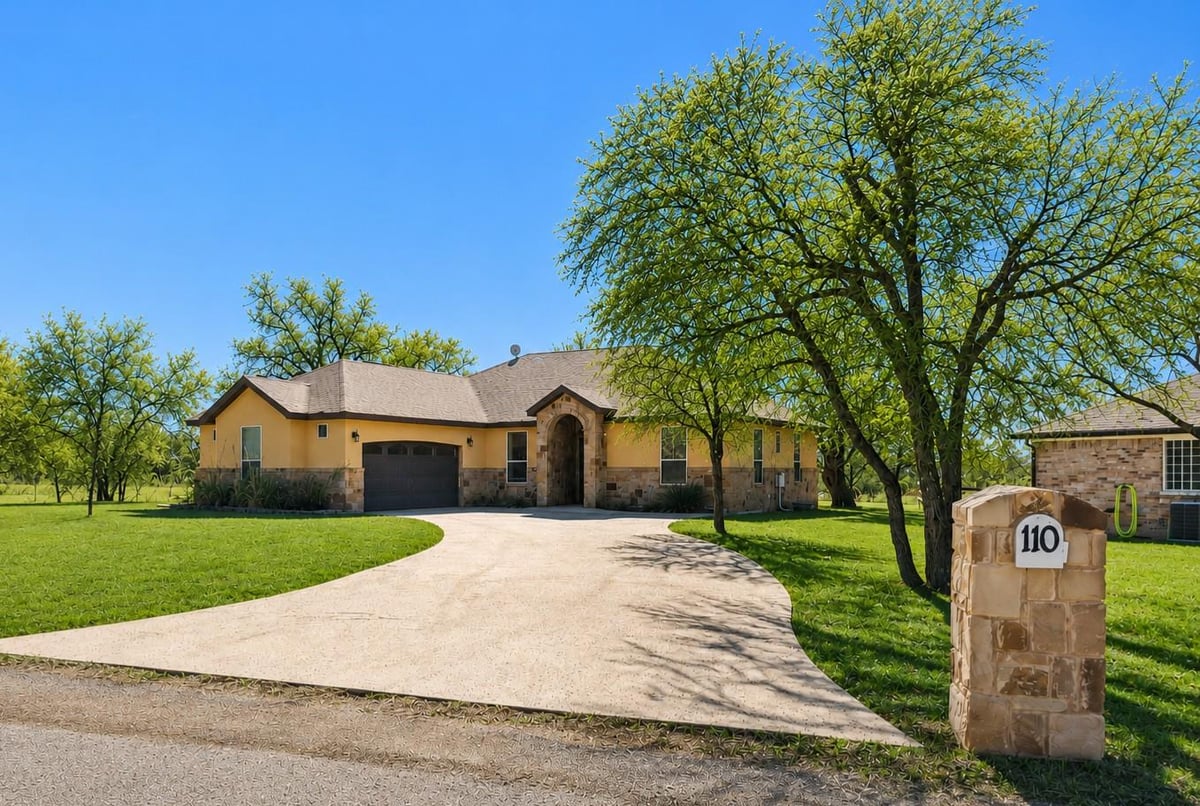View 110 Chaumont ST in Granite Ridge Packsaddle 110 Chaumont ST - front exterior - Luxury home in Granite Ridge Packsaddle, Kingsland, TX
