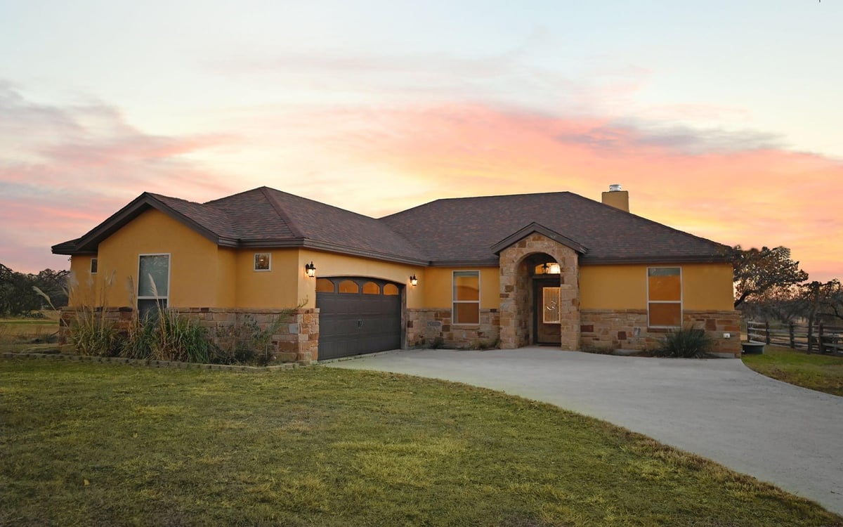 View 110 Chaumont St in Granite Ridge Packsaddle 110 Chaumont St - front exterior - Luxury home in Granite Ridge Packsaddle, Kingsland, TX