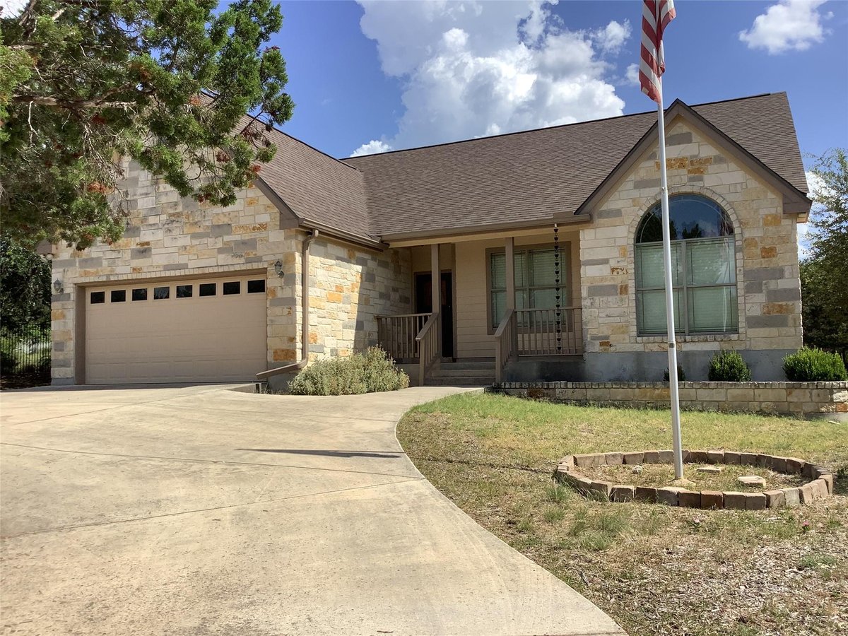 View 110 Crazy Cross RD in Woodcreek Sec 20 110 Crazy Cross RD - front exterior - Luxury home in Woodcreek Sec 20, Wimberley, TX
