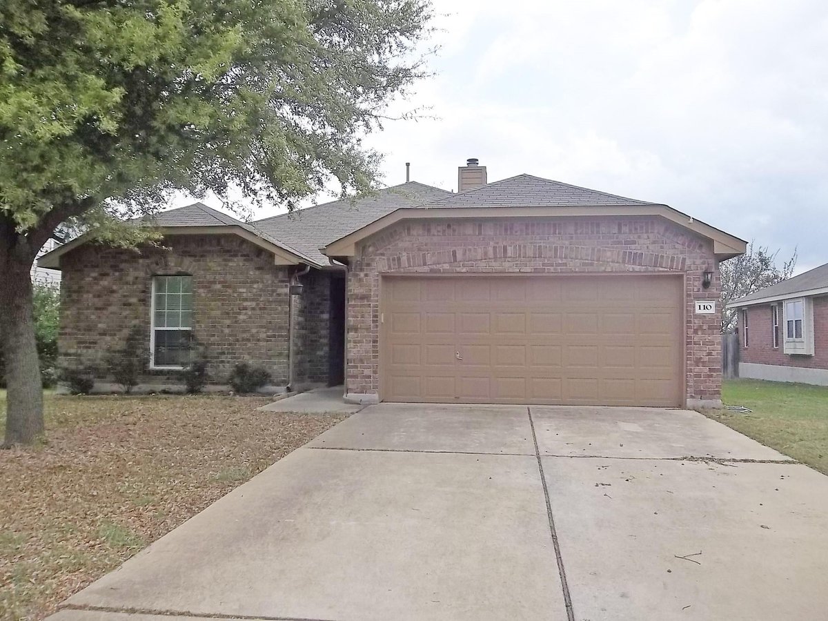 View 110 Fossil Trl in Old Town Village Sec 02b 110 Fossil Trl - front exterior - Luxury home in Old Town Village Sec 02b, Leander, TX