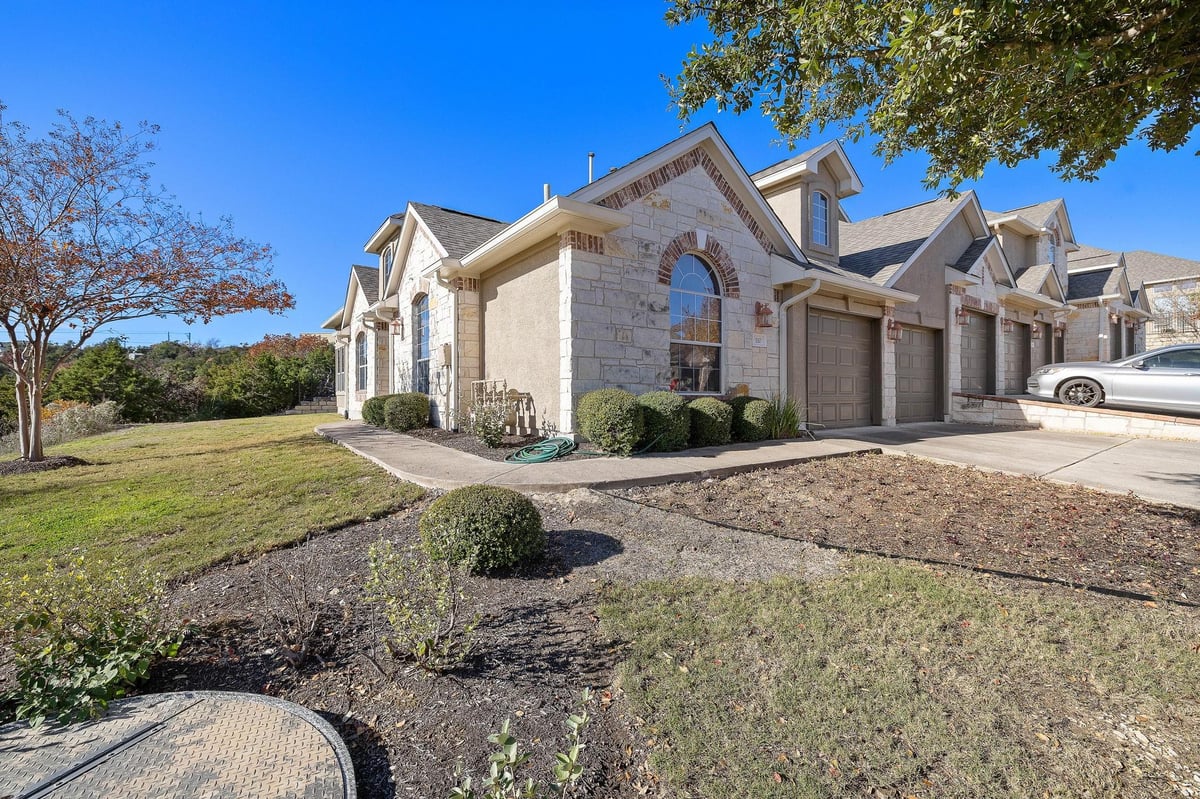 View 110 Sunrise Ridge CV Unit #1504 in Enclave At Alta Vista Amd 110 Sunrise Ridge CV Unit #1504 - front exterior - Luxury home in Enclave At Alta Vista Amd, Austin, TX
