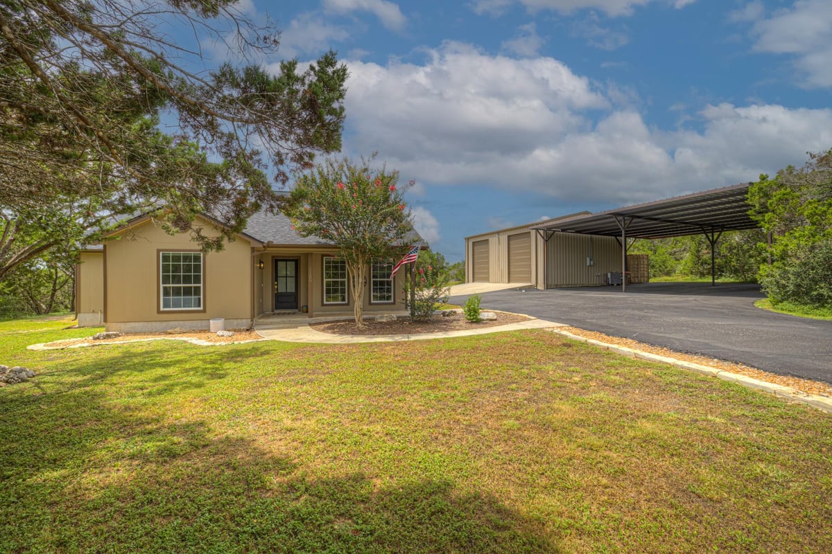 View 1100 Yaupon DR in Rancho Del Lago 2 1100 Yaupon DR - front exterior - Luxury home in Rancho Del Lago 2, Fischer, TX