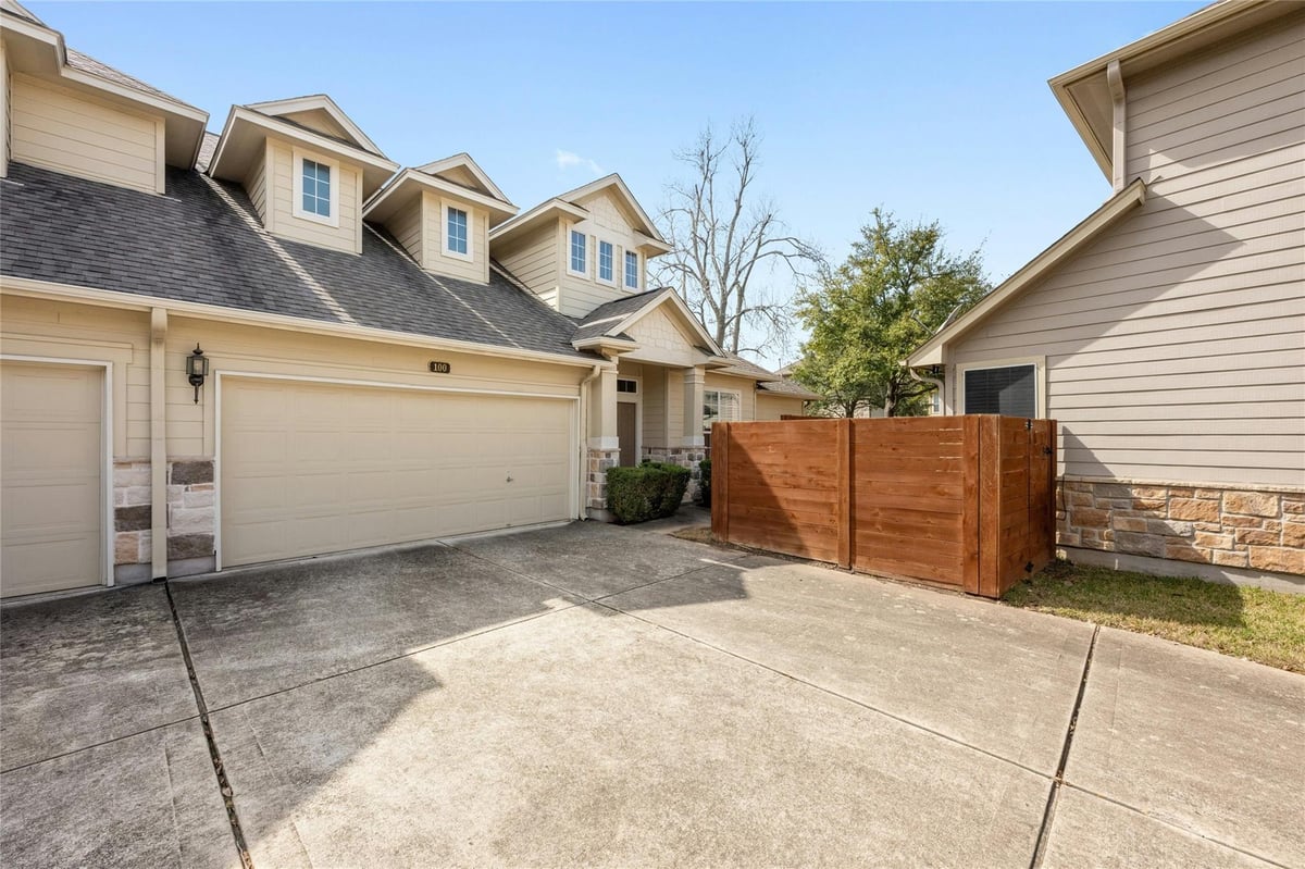 View 11000 Anderson Mill Rd Unit #100 in Courtyard Homes At Anderson Oaks Condo Ph 03 11000 Anderson Mill Rd Unit #100 - front exterior - Luxury home in Courtyard Homes At Anderson Oaks Condo Ph 03, Austin, TX