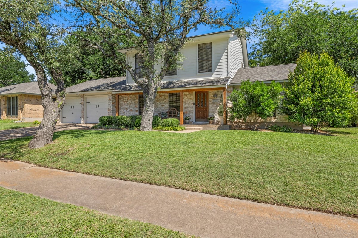 View 11002 Hillside Oak LN in Deerbrook Village 11002 Hillside Oak LN - front exterior - Luxury home in Deerbrook Village, Austin, TX