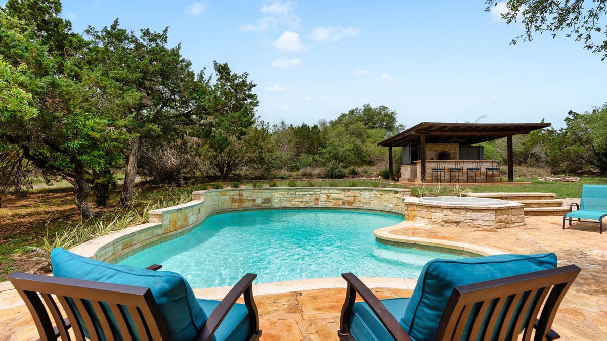 View 11008 West Cave Blvd in West Cave Estates 11008 West Cave Blvd - front exterior - Luxury home in West Cave Estates, Dripping Springs, TX