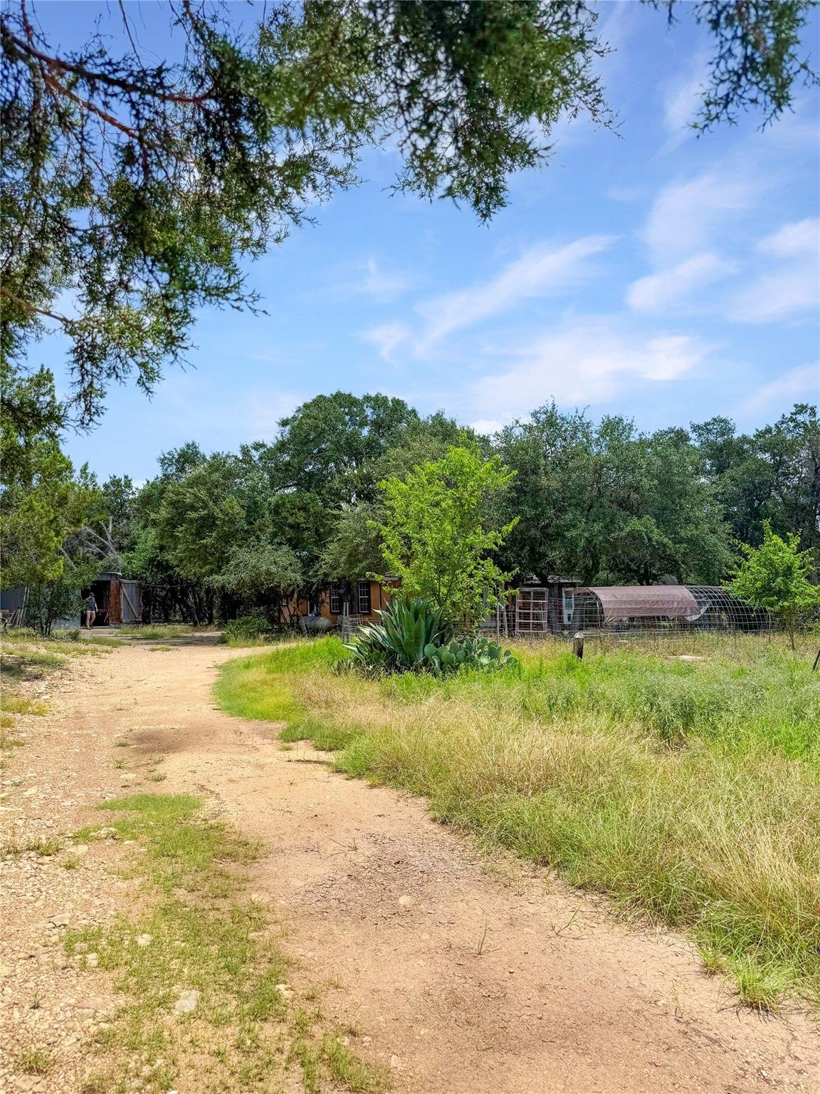 View 1101 Days End RD in Burnett Ranch Sec 3 1101 Days End RD - front exterior - Luxury home in Burnett Ranch Sec 3, Wimberley, TX