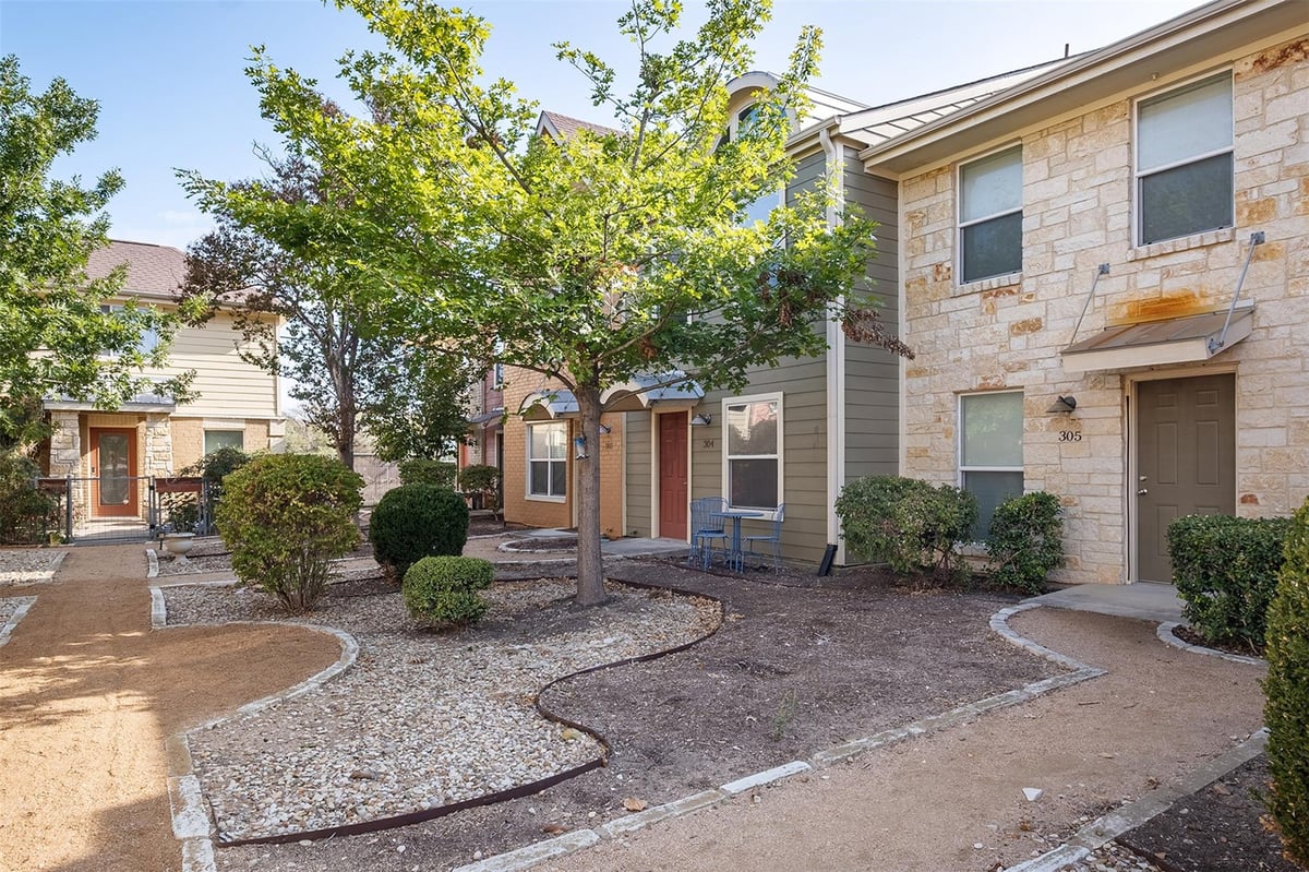 View 1101 Grove Blvd Unit #304 in Townhomes At Riverside Grove 1101 Grove Blvd Unit #304 - front exterior - Luxury home in Townhomes At Riverside Grove, Austin, TX