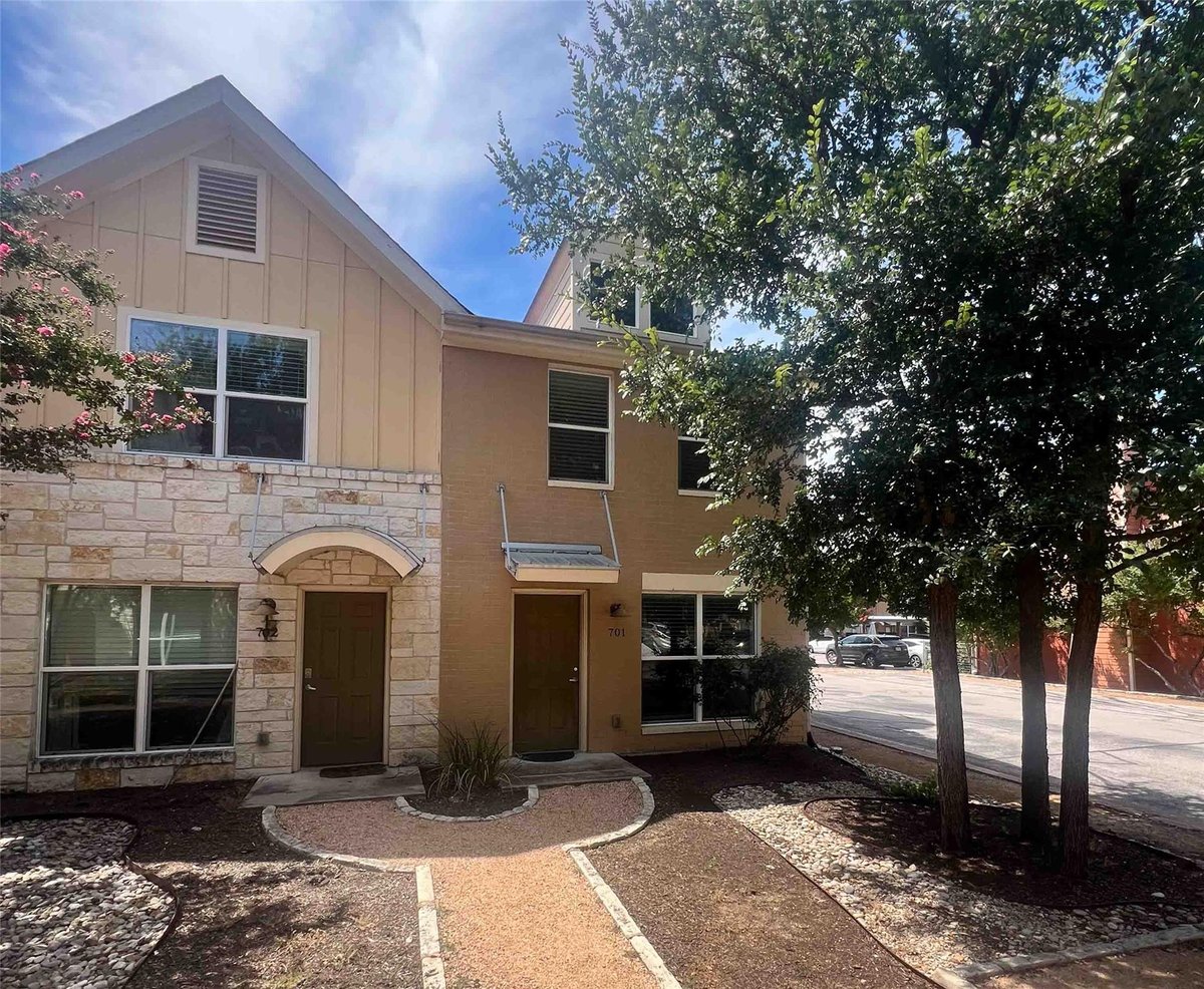 View 1101 Grove BLVD Unit #701 in Townhomes At Riverside Grove 1101 Grove BLVD Unit #701 - property photo 1 - Luxury home in Townhomes At Riverside Grove, Austin, TX