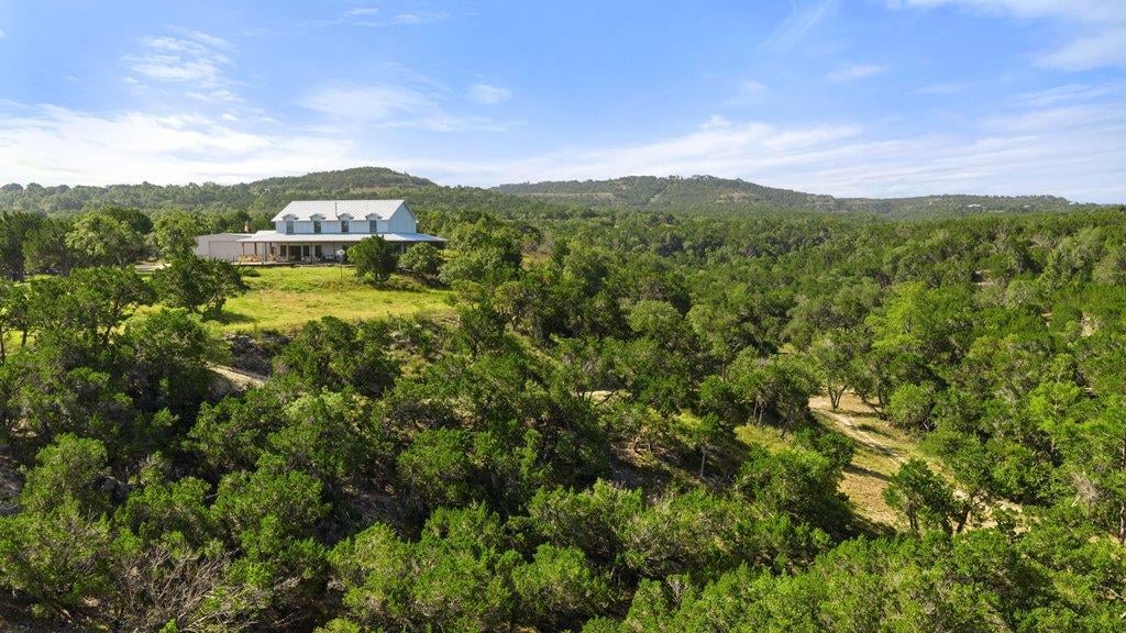 View 1101 Windy Hills RD in Glenn H Kothmann Prop 1101 Windy Hills RD - front exterior - Luxury home in Glenn H Kothmann Prop, Dripping Springs, TX