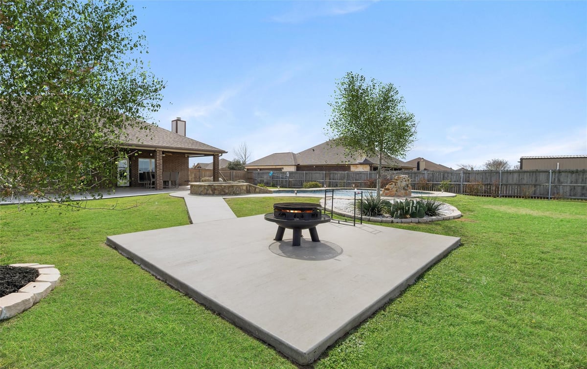 Primary bedroom at 11010 La Paloma Loop W - 4 bed 3 bath home