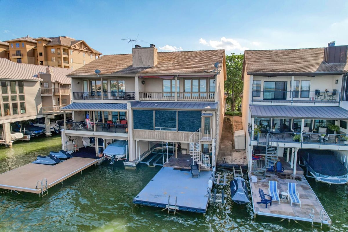 View 1103 The Cape RD Unit #2 in Emerald Point 1103 The Cape RD Unit #2 - front exterior - Luxury home in Emerald Point, Horseshoe Bay, TX