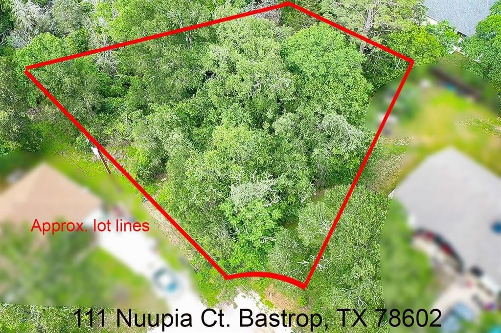 View 111 Nuupia Ct in Tahitian Village 111 Nuupia Ct - front exterior - Luxury lot in Tahitian Village, Bastrop, TX