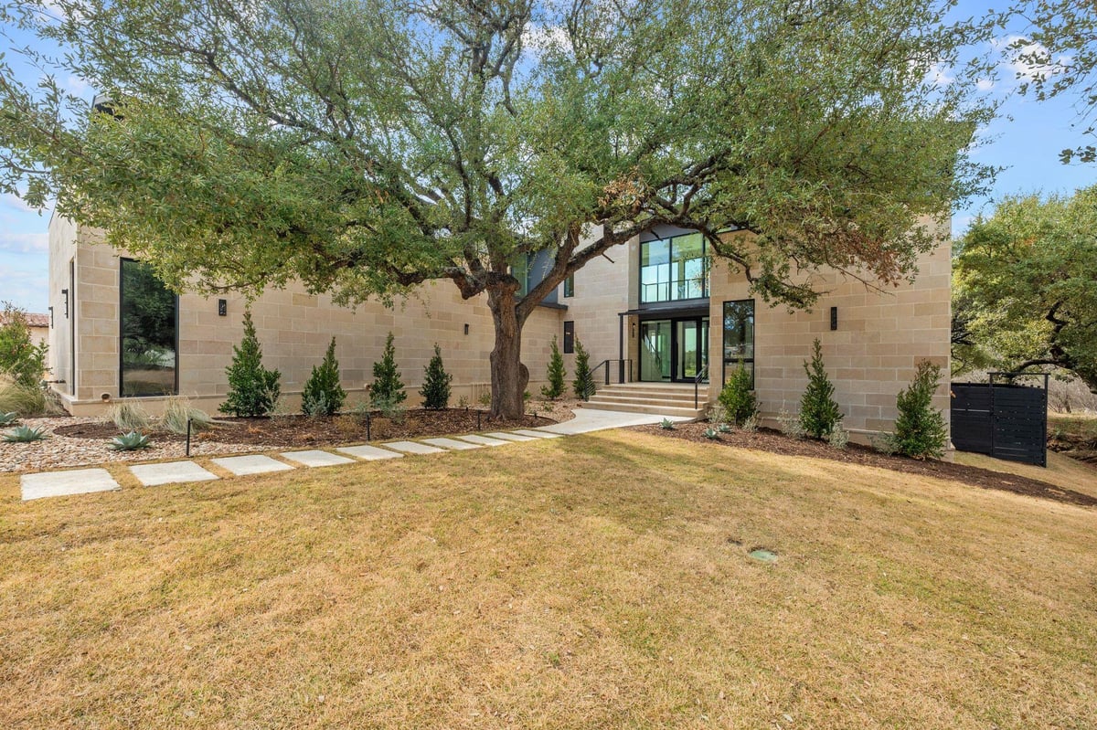 111 Orange Plume - front exterior with 111 Orange Plume in Horseshoe Bay - Luxury home in Summit Rock, Horseshoe Bay, TX