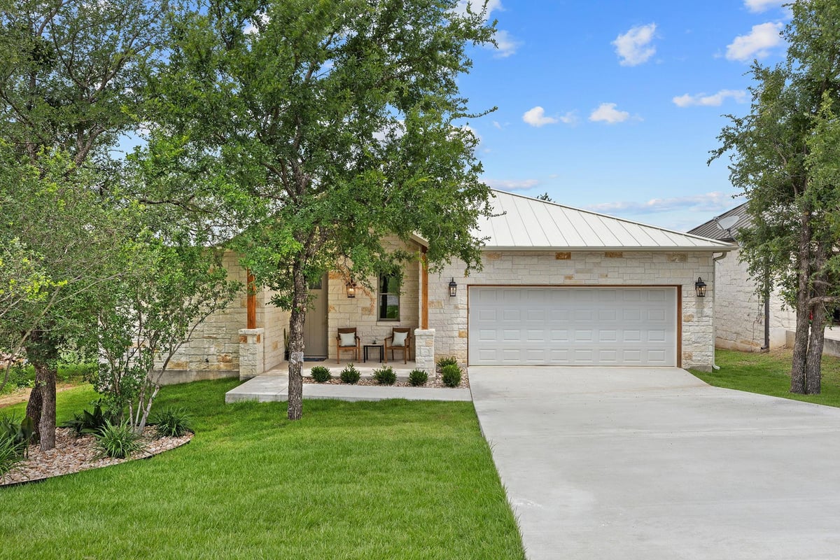 View 1110 Monterrey Oak Cir in Four Oaks 1110 Monterrey Oak Cir - property photo 1 - Luxury home in Four Oaks, Marble Falls, TX