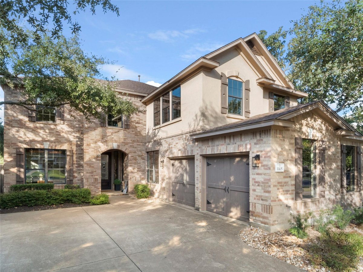 View 11105 Bastogne Loop in Lacrosse Sec 02 11105 Bastogne Loop - front exterior - Luxury home in Lacrosse Sec 02, Austin, TX
