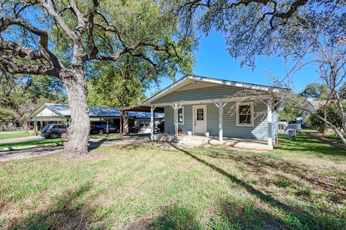 View 1113 County Road 132B in Kingsland Cove Unit 1 1113 County Road 132B - front exterior - Luxury home in Kingsland Cove Unit 1, Kingsland, TX