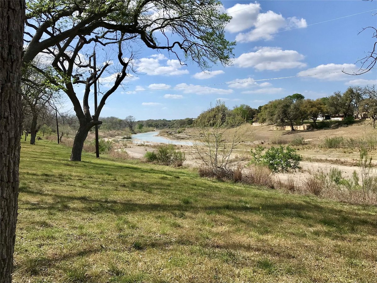 Primary bedroom at 1113 Hidden Valley Rd - Hidden Valley Estates, Wimberley, TX