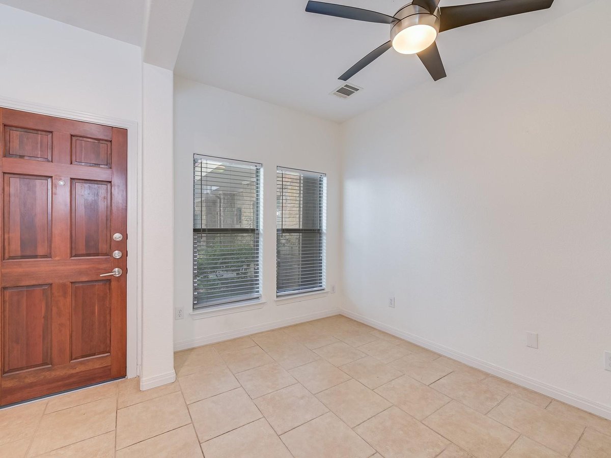 Primary bedroom at 1115 Kinney Ave Unit #9 - 2 bed 2 bath home