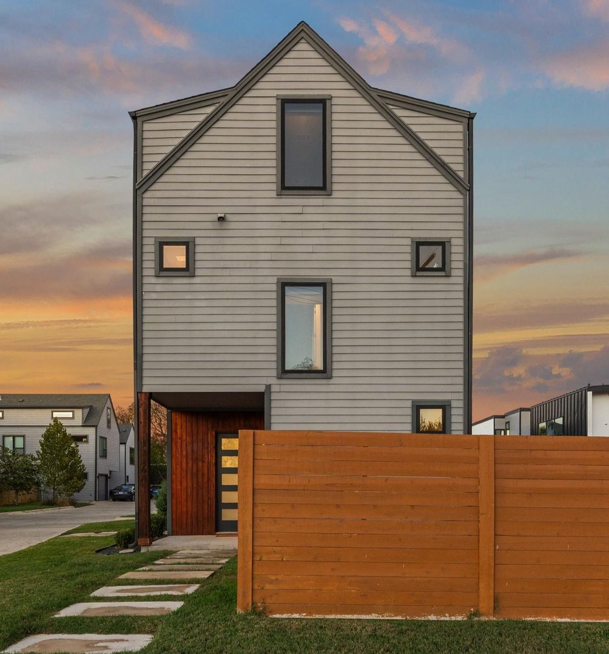 1116 Stobaugh St Unit #A - front exterior - Luxury home in Crestview Northgate Addn, Austin, TX